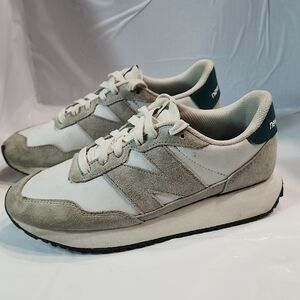 New Balance 237 sneakers, featuring a white and grey W 10 M 8.5
